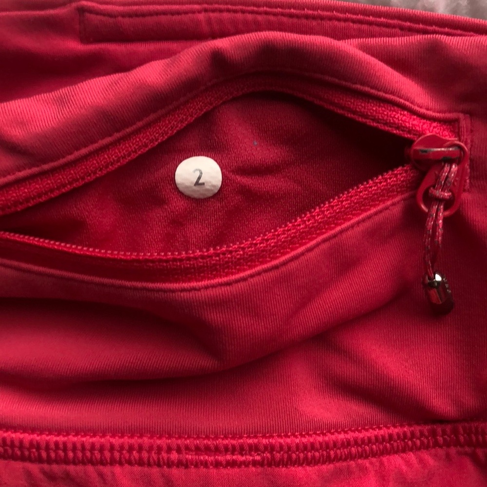 size 2 lululemon tracker shorts; hot pink